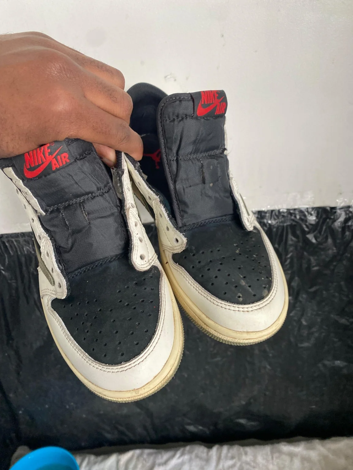 Black and cream low-tops, before care
